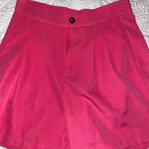 Pink mid length high waisted shorts